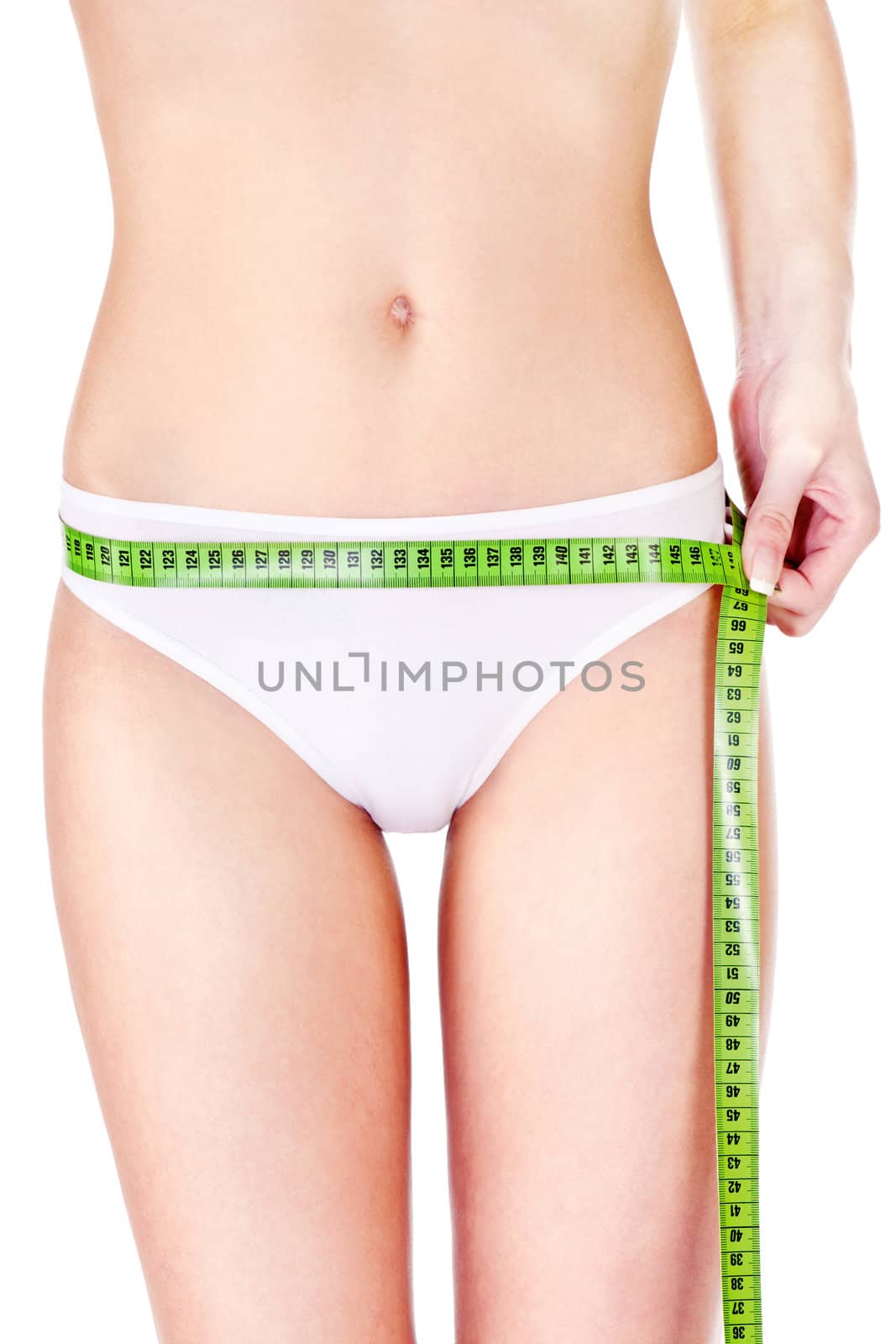 Measure tape around slim woman's hip, isolated on white. Health concept 