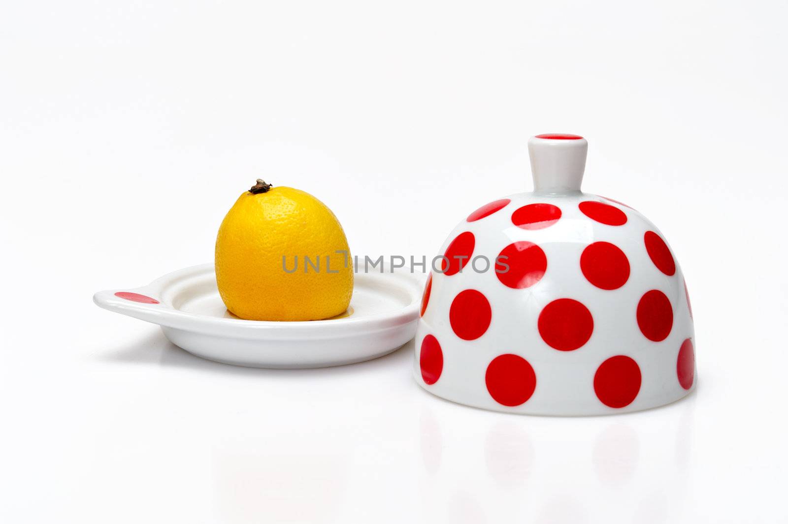 Half of lemon in a open bank on a white background