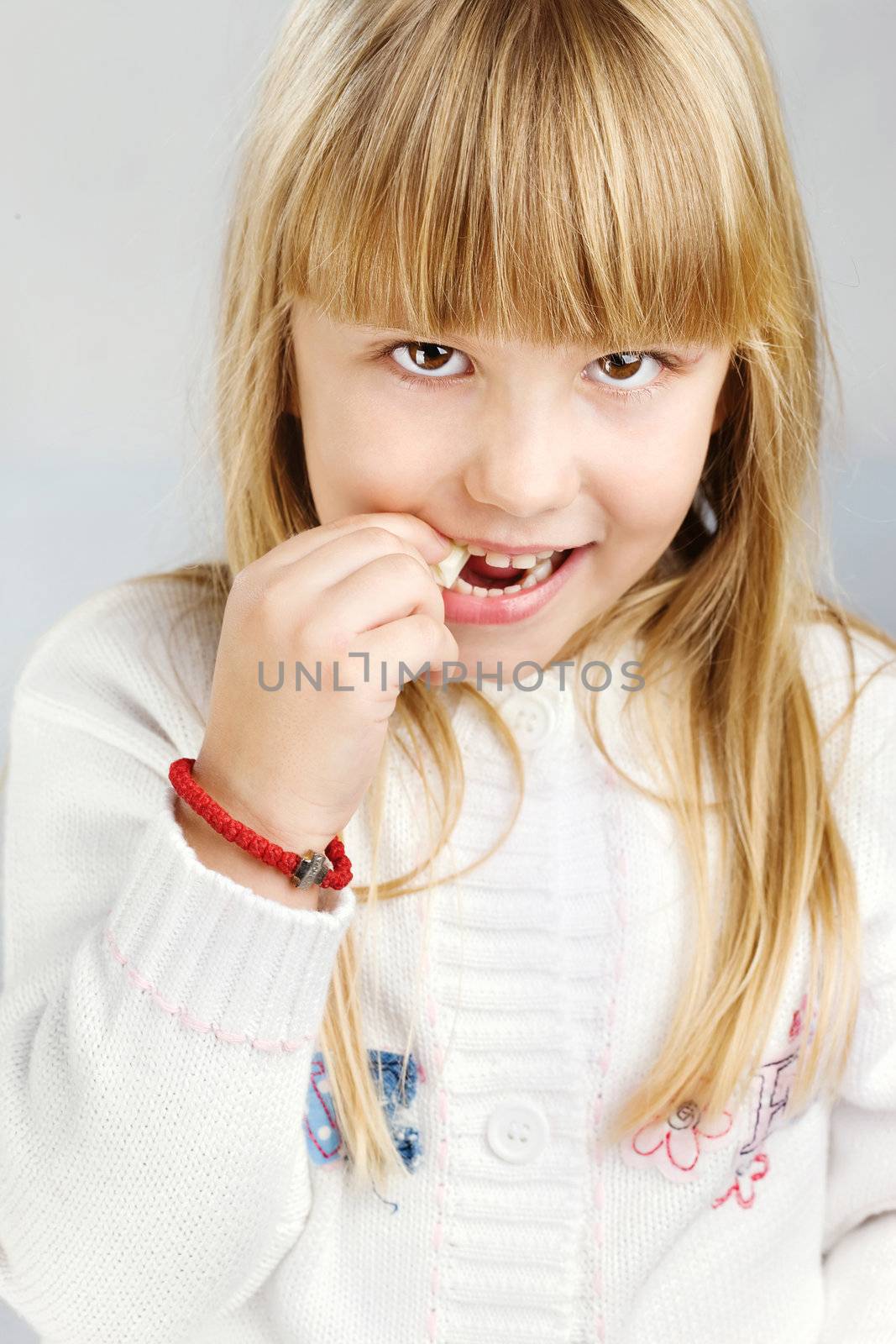 Blue hair girl eating candy