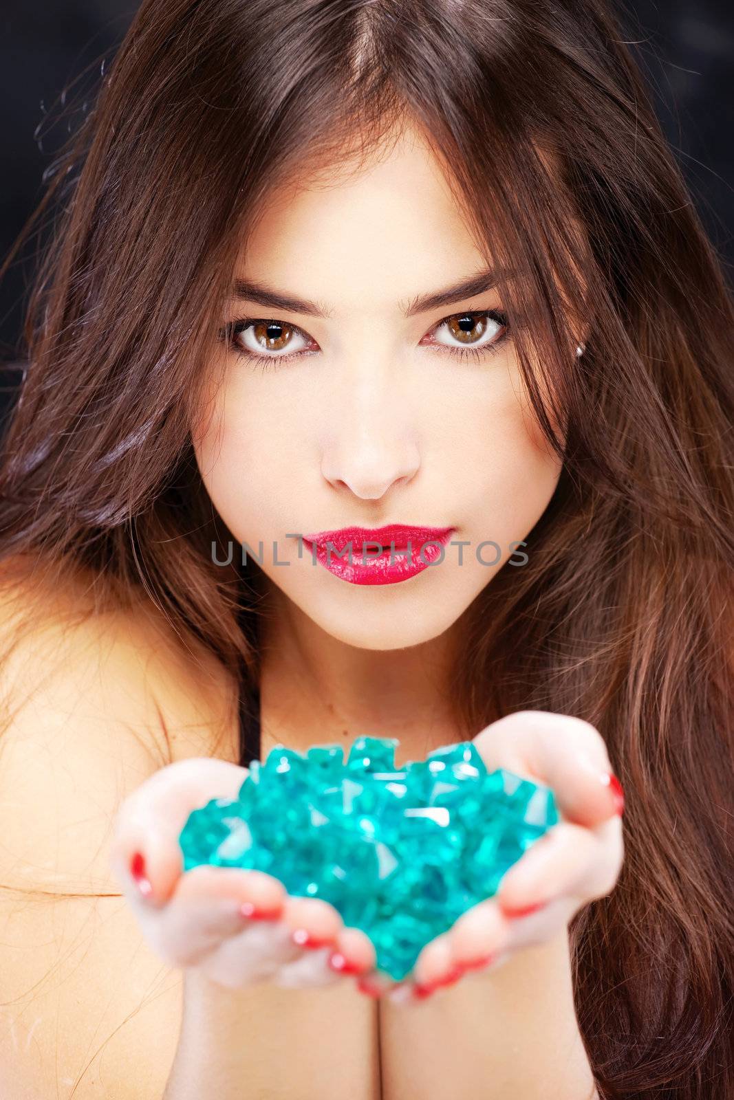 pretty woman with blue rocks
