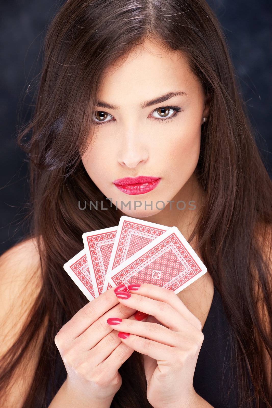 Pretty woman holding cards by imarin