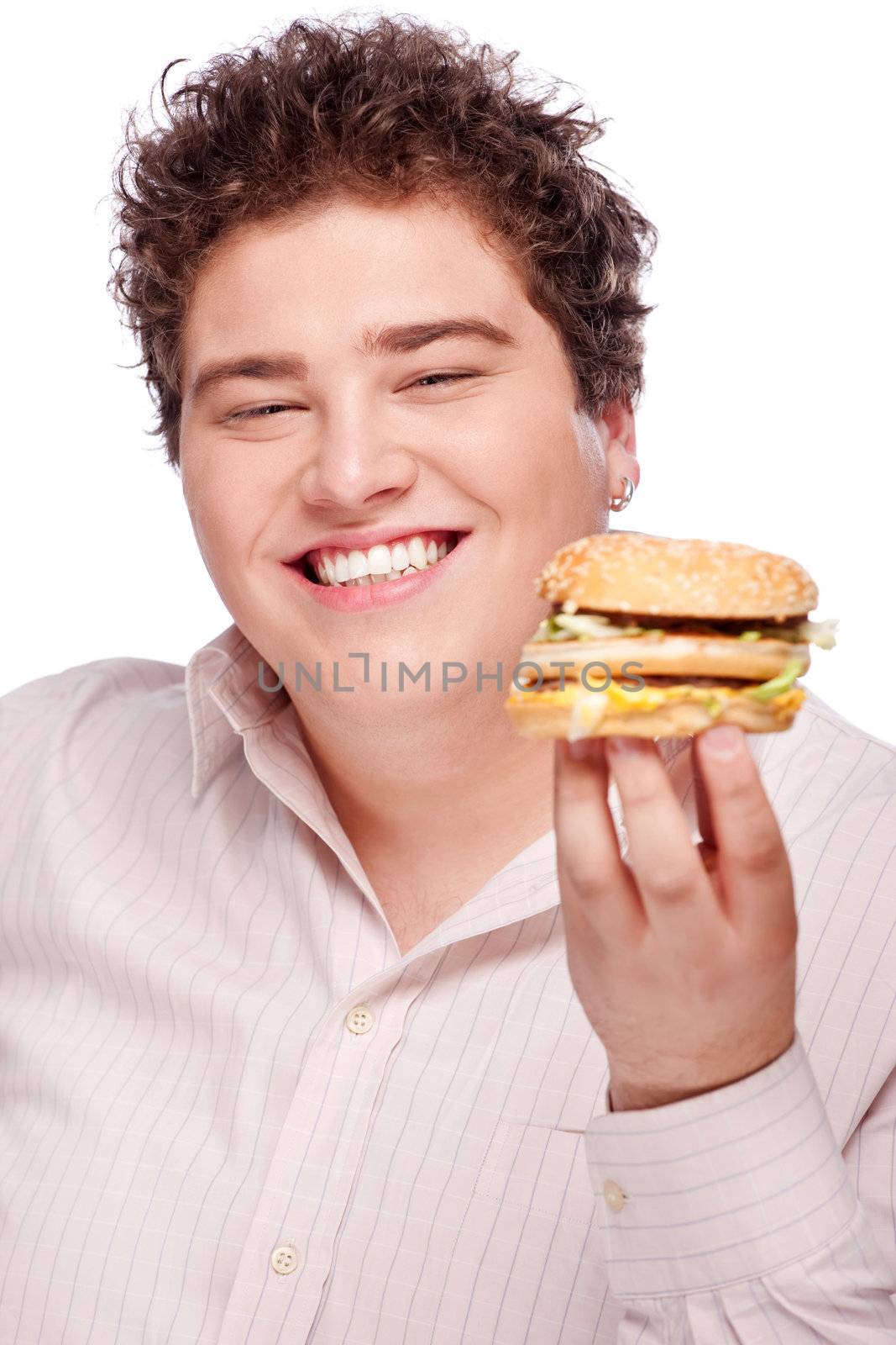 Smiled chubby holding a hamburger, isolated on white