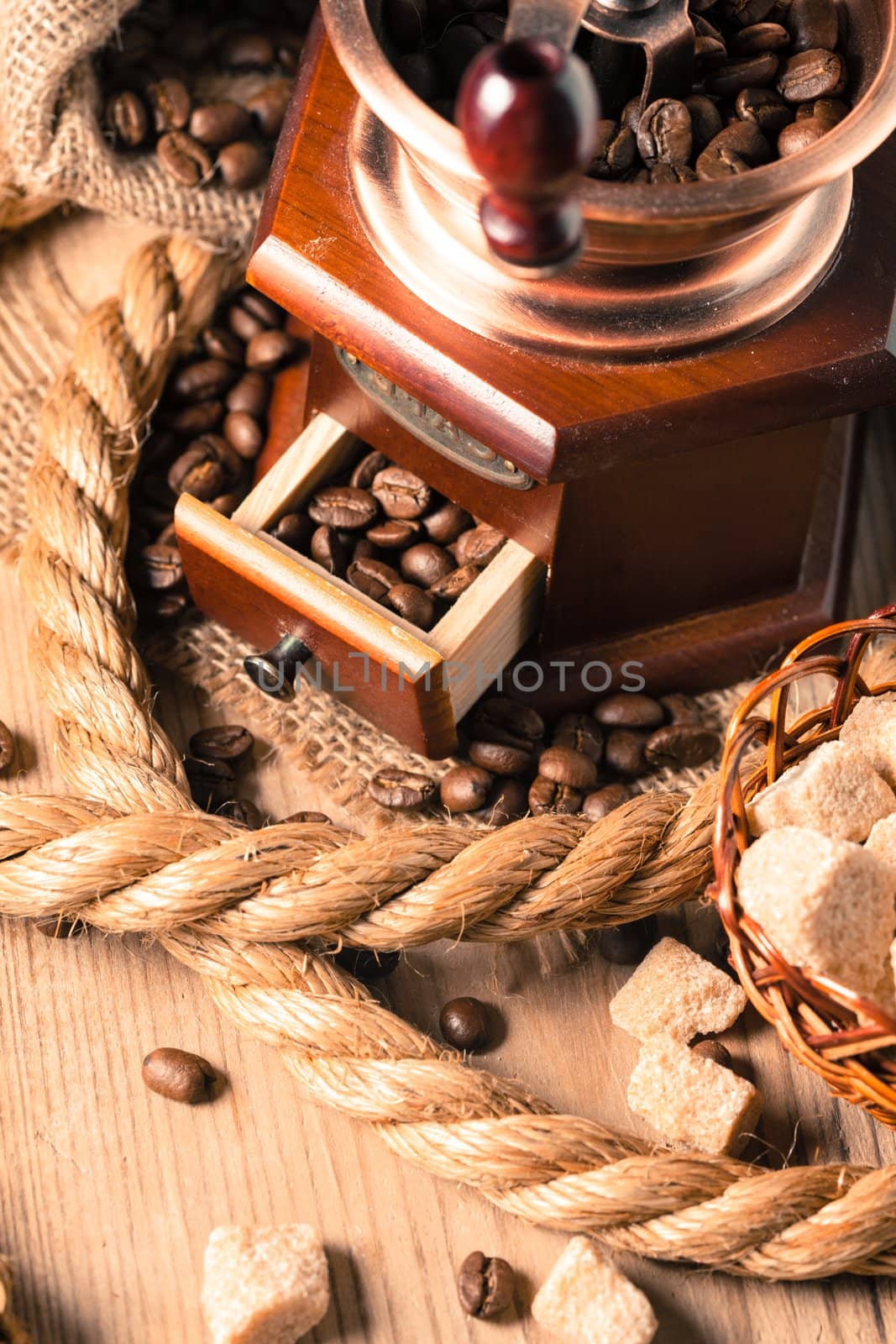 Coffee in grinder and rope still life