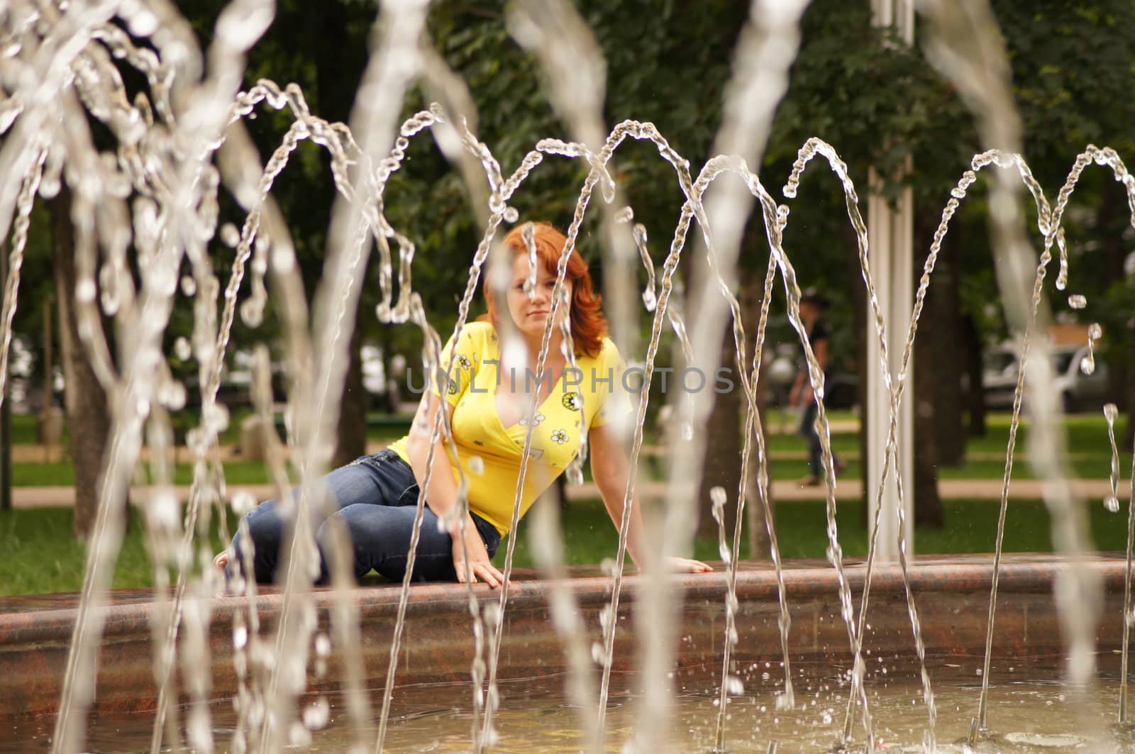 The young cheerful girl on walk