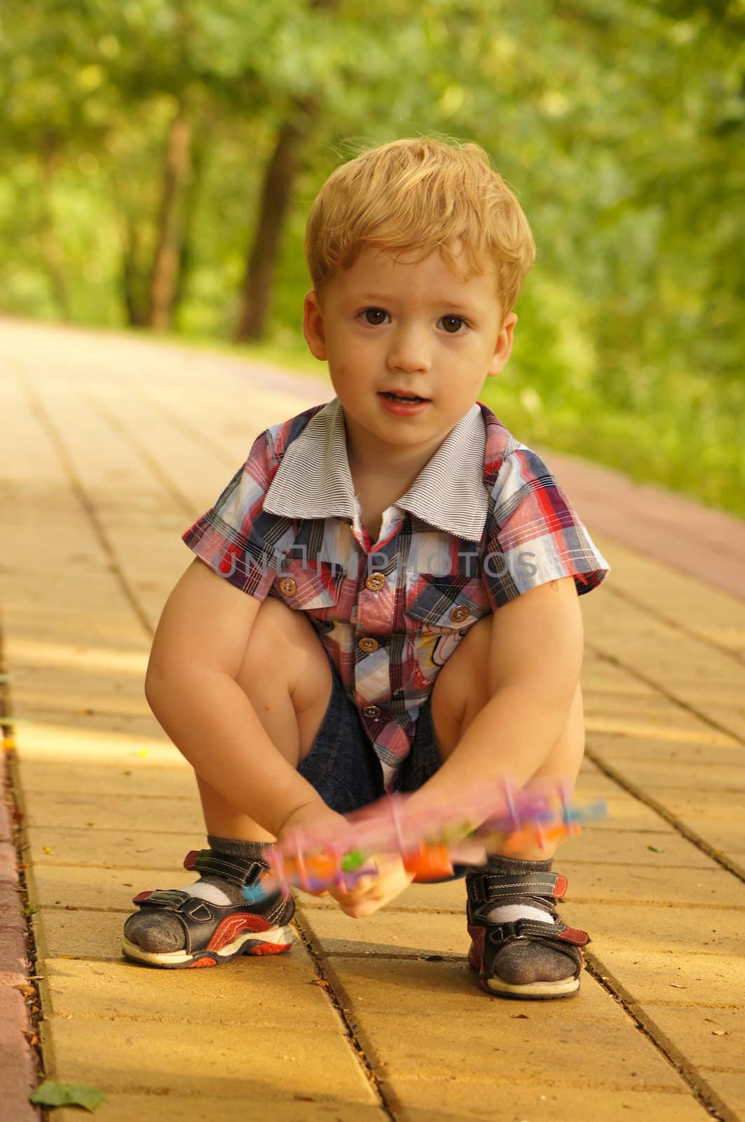 The little boy on walk