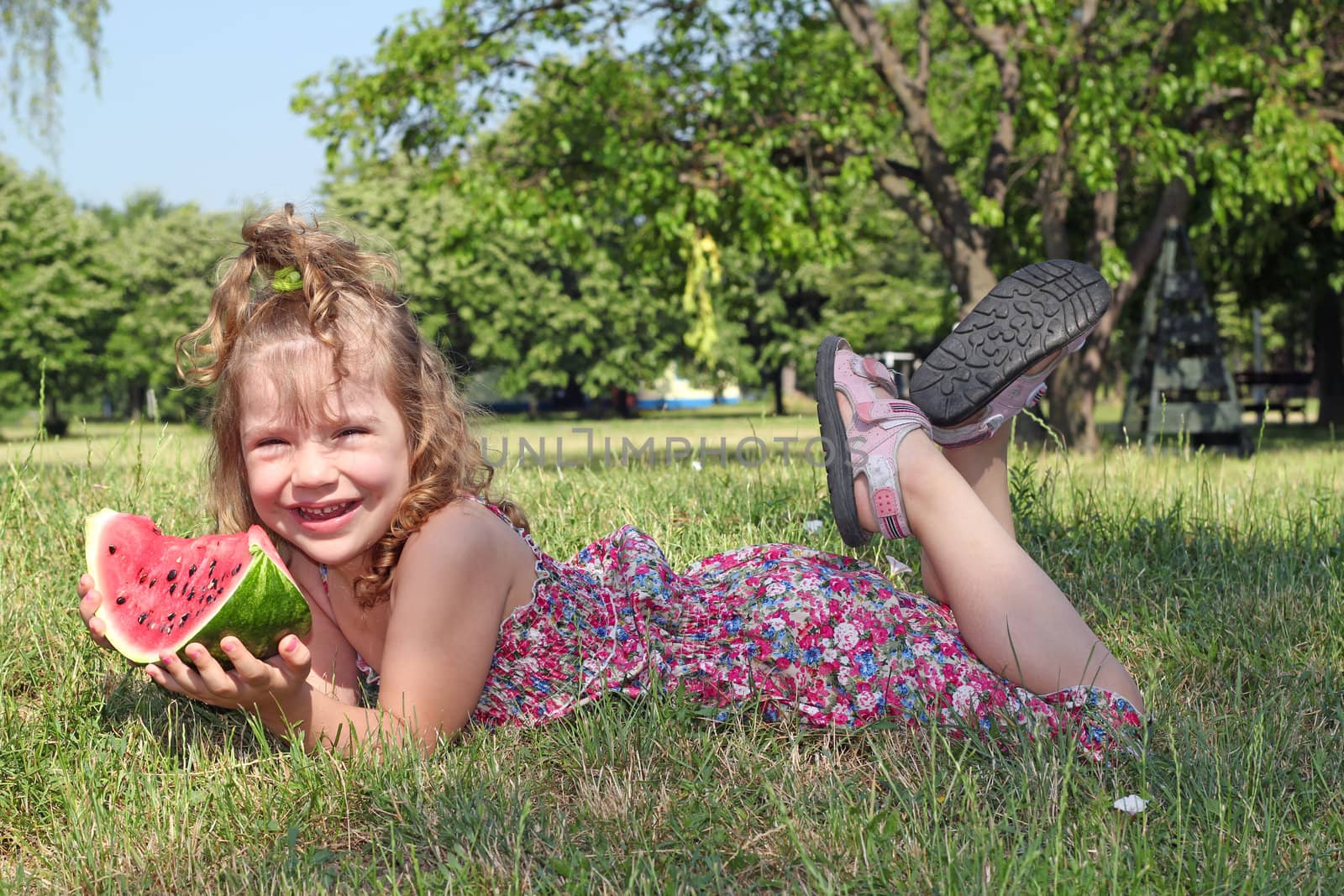 happy little girl with watermelon