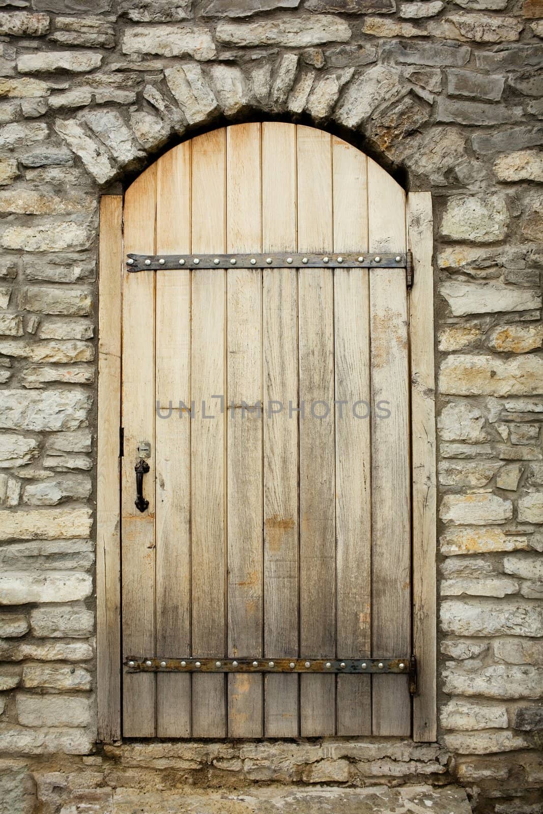 An image of a yellow door of a fortres