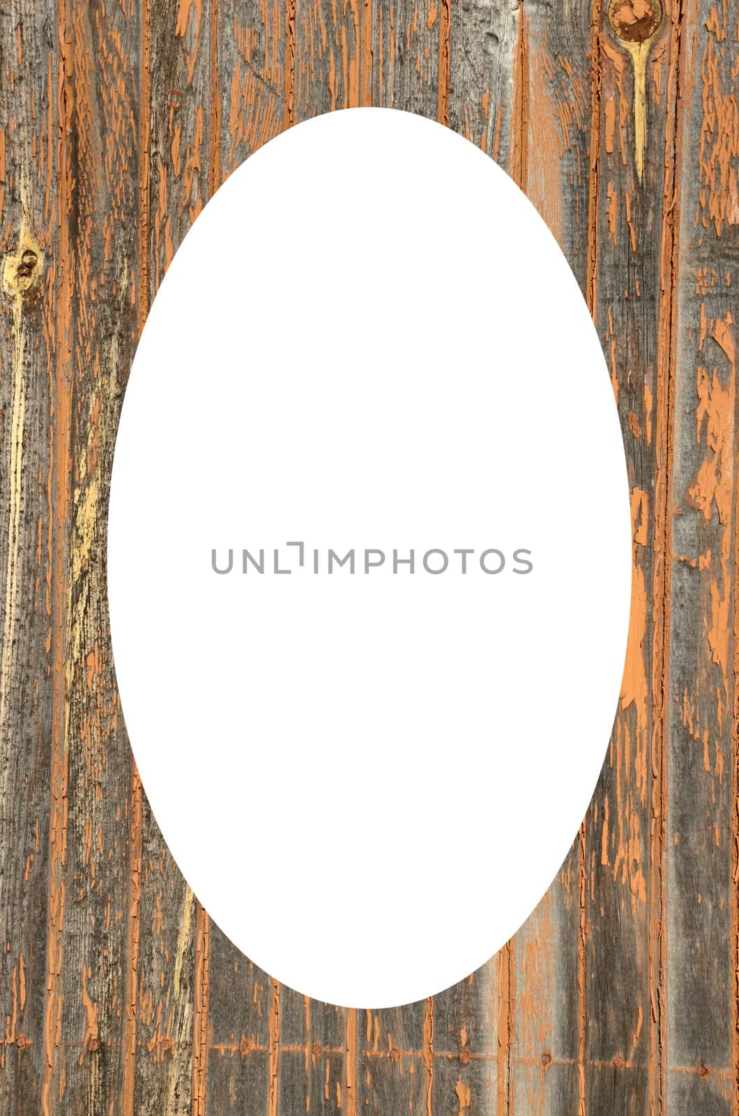 Isolated white oval place for text photograph image in center of frame. Paint stripped off old factory door. Wooden background textures.