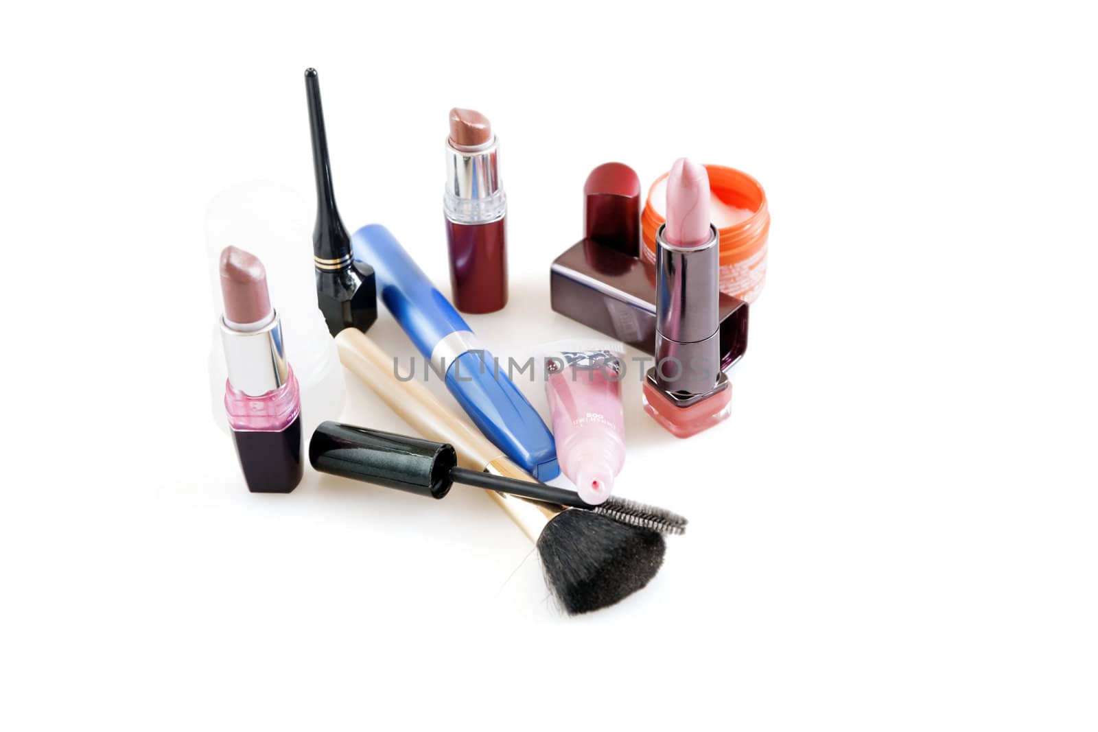 Modern cosmetic accessories on a white background