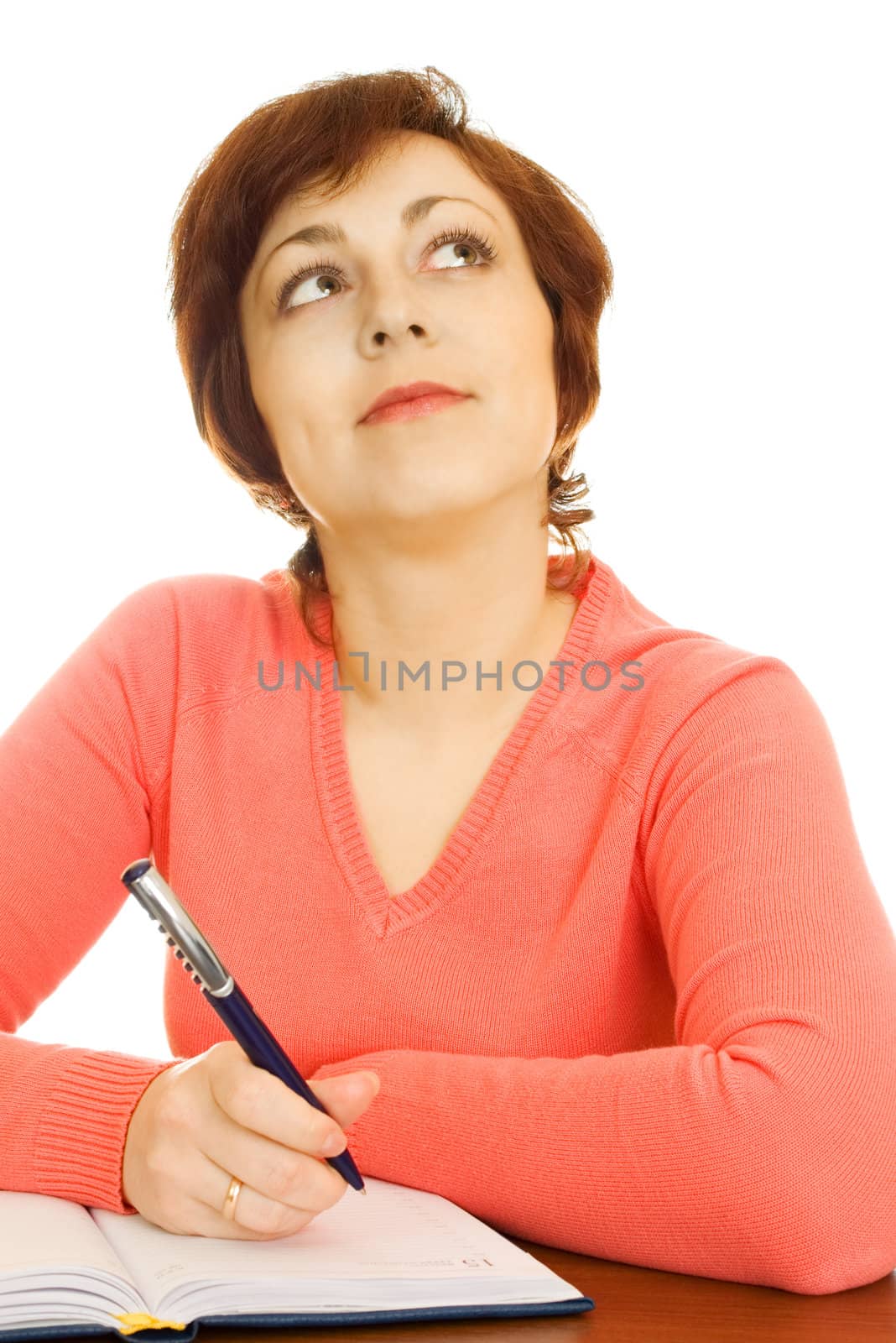 Writing young woman isolated on white background