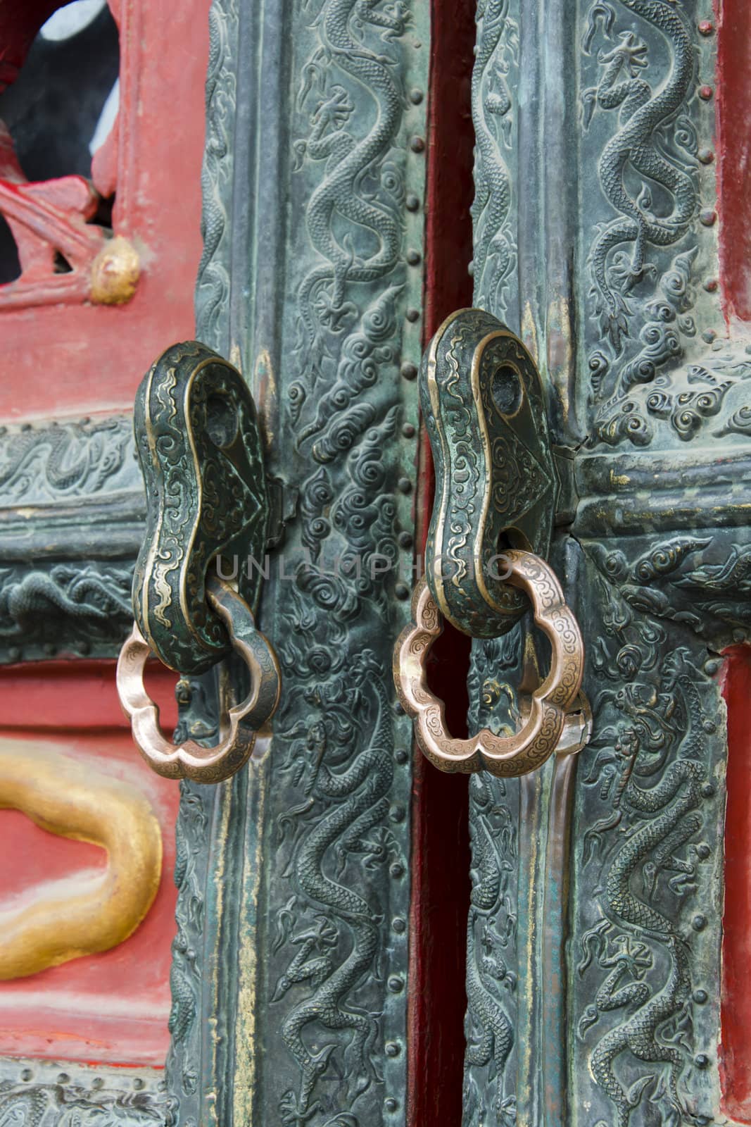 close up of door carvings in the forbidden city china