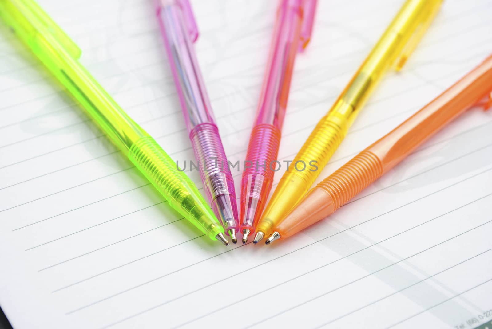 Color pens on the  writing-book
