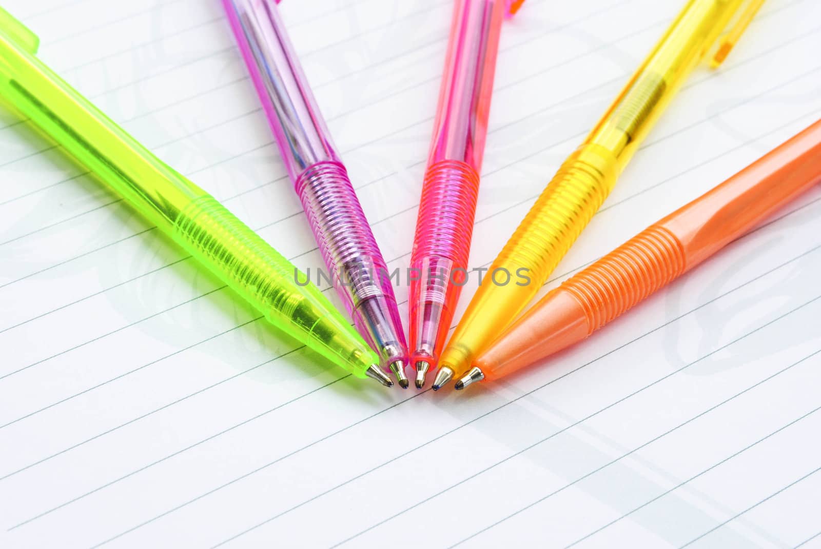 Color pens on the  writing-book
