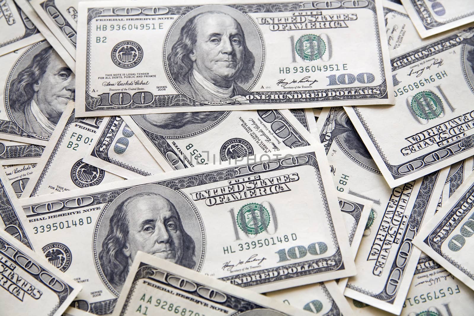 background from chaotically lyings one hundred greenbacks