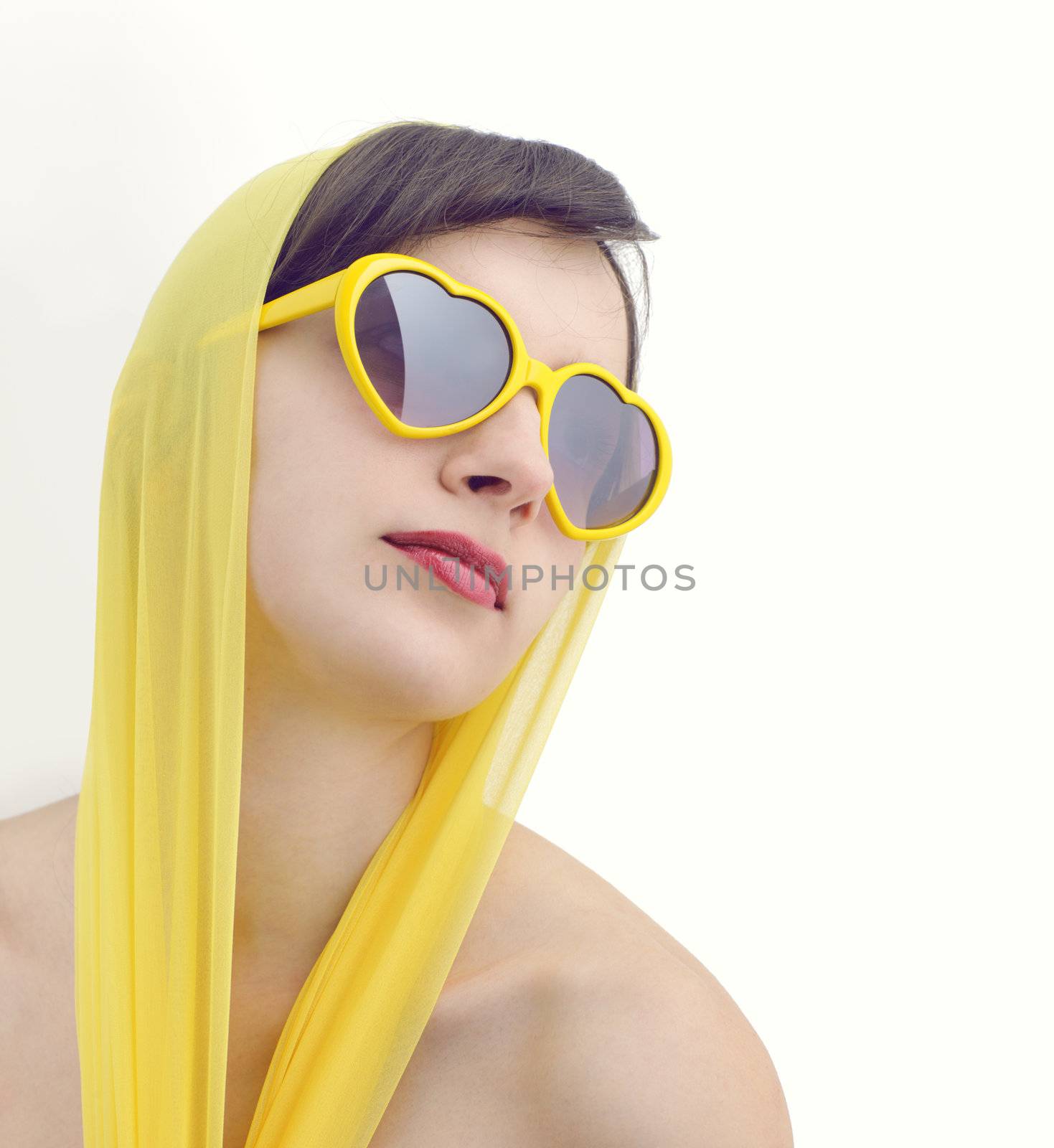 Young beautiful woman in sunglasses 