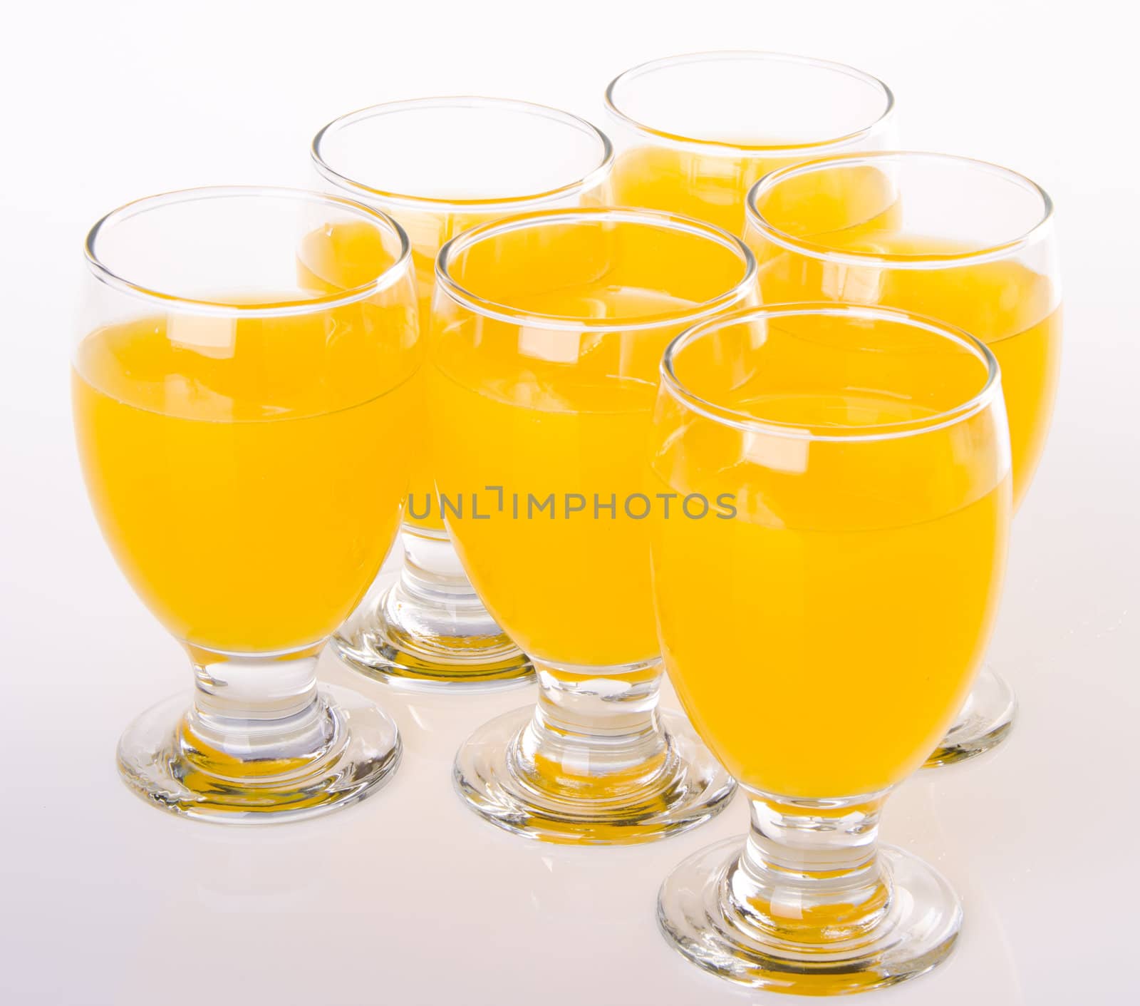 Orange juice on white background