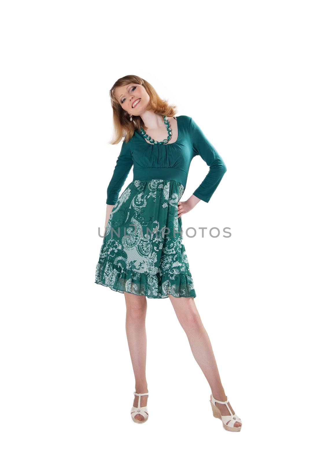 beautiful woman in a green dress and beads isolated on white background