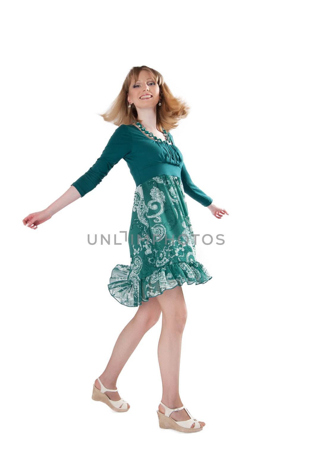 beautiful woman in a green dress and beads isolated on white background