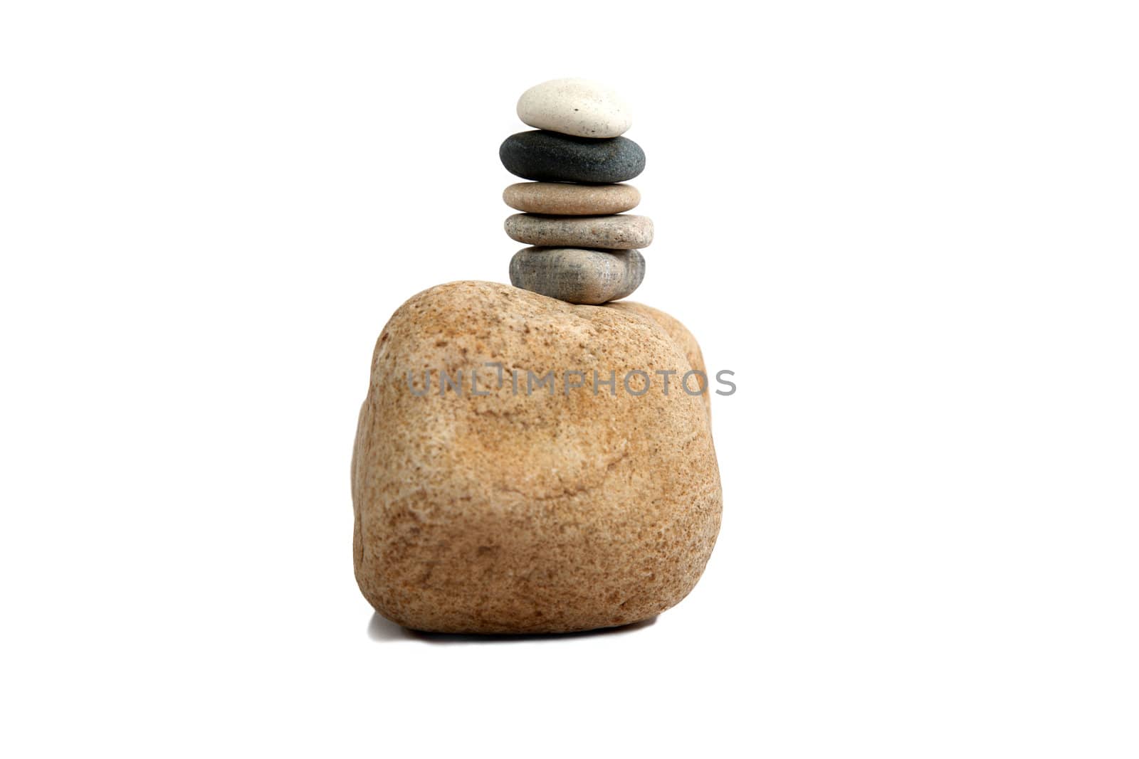 Stack of spa pebbles against blurred background
