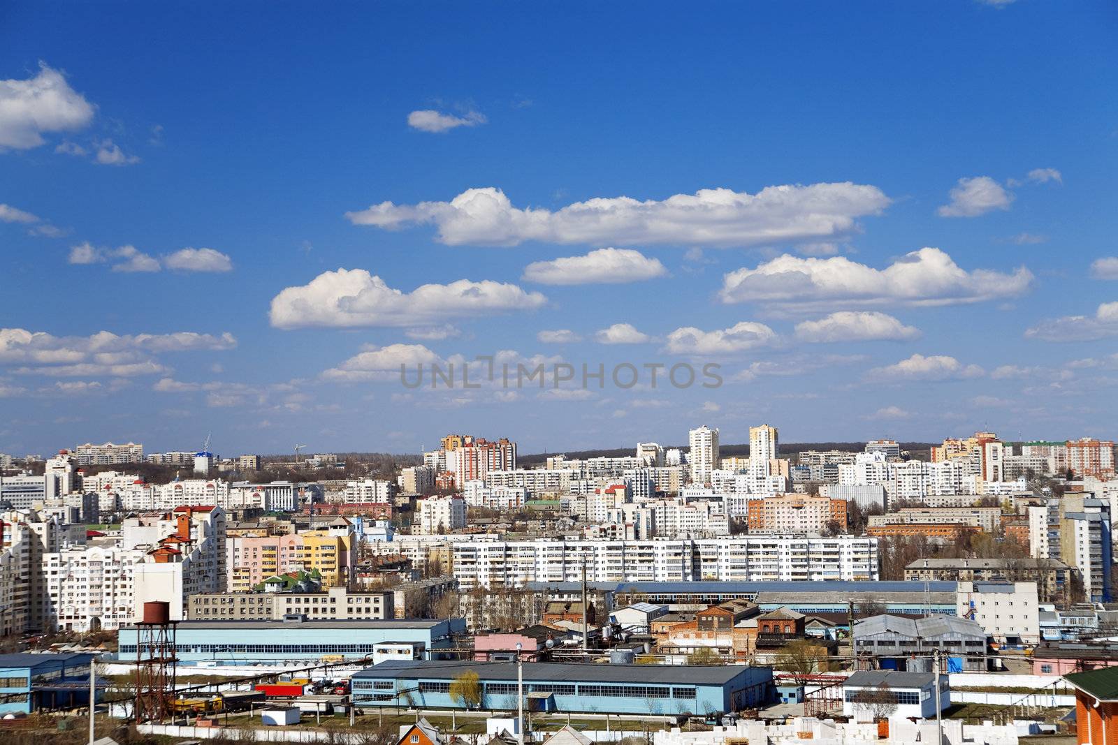 town view with buildings and blue sky by Serp