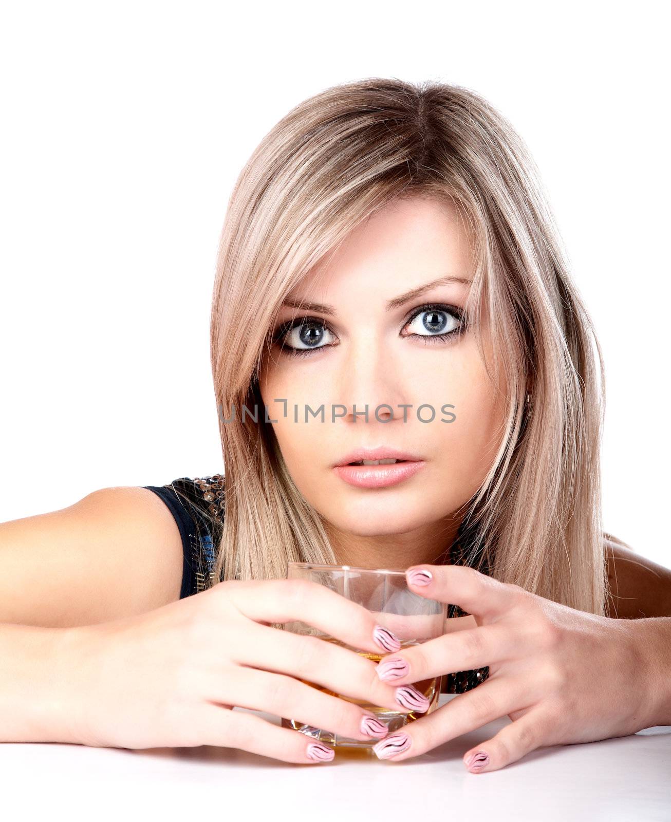 The girl with  glass of whisky on a white background