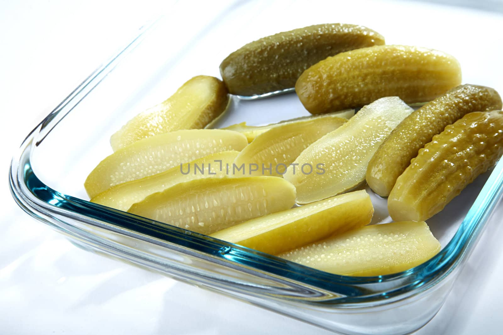 The cut and whole pickles in glasswares