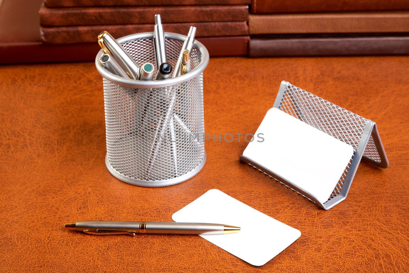 Organizer support for papers and  pen on a textural background
