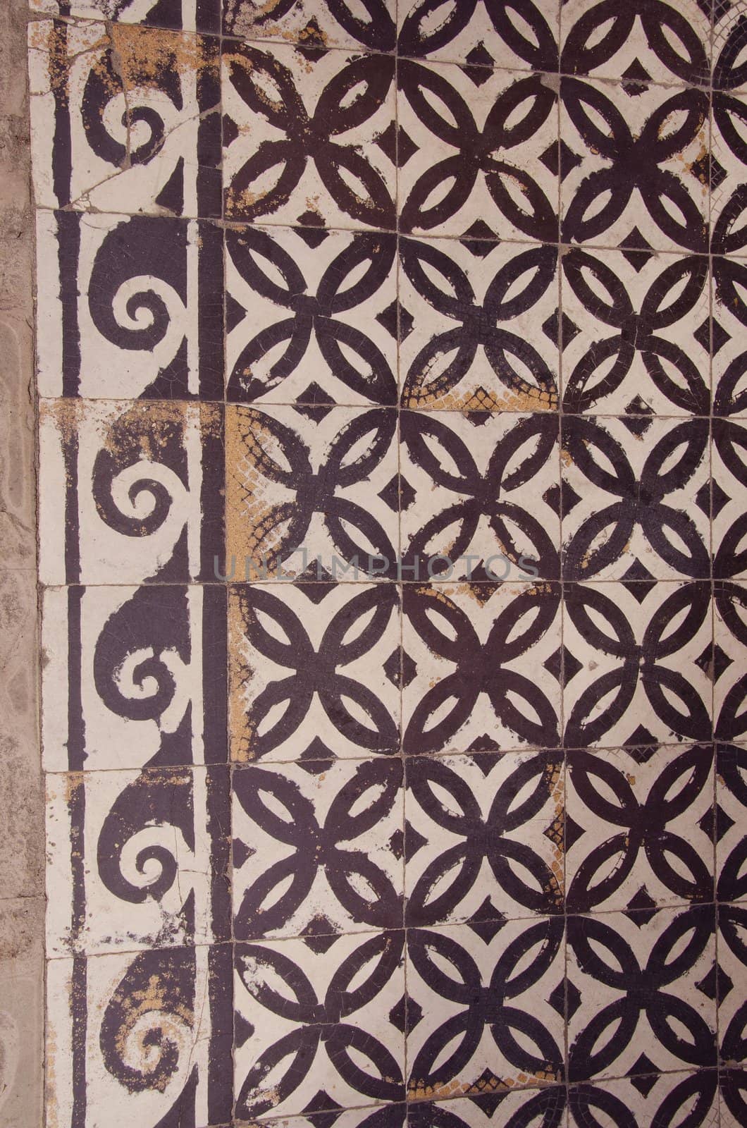 Detail of old decorative tiles walkway. Nice backdrop.