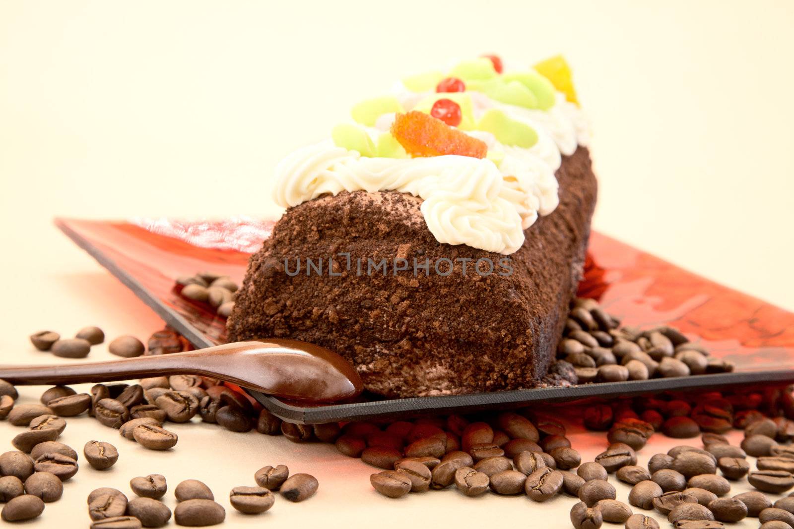 Pie on a plate with coffee grains .yellow background.