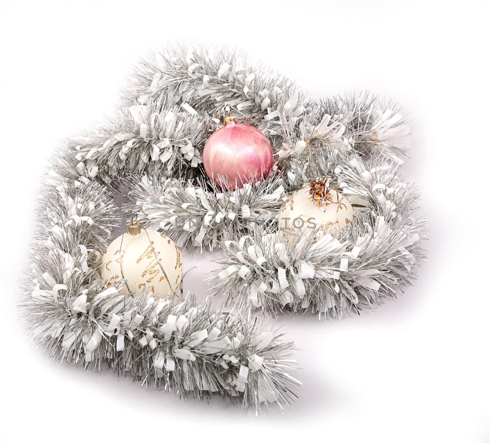 Fur-tree spheres and garland on a white background