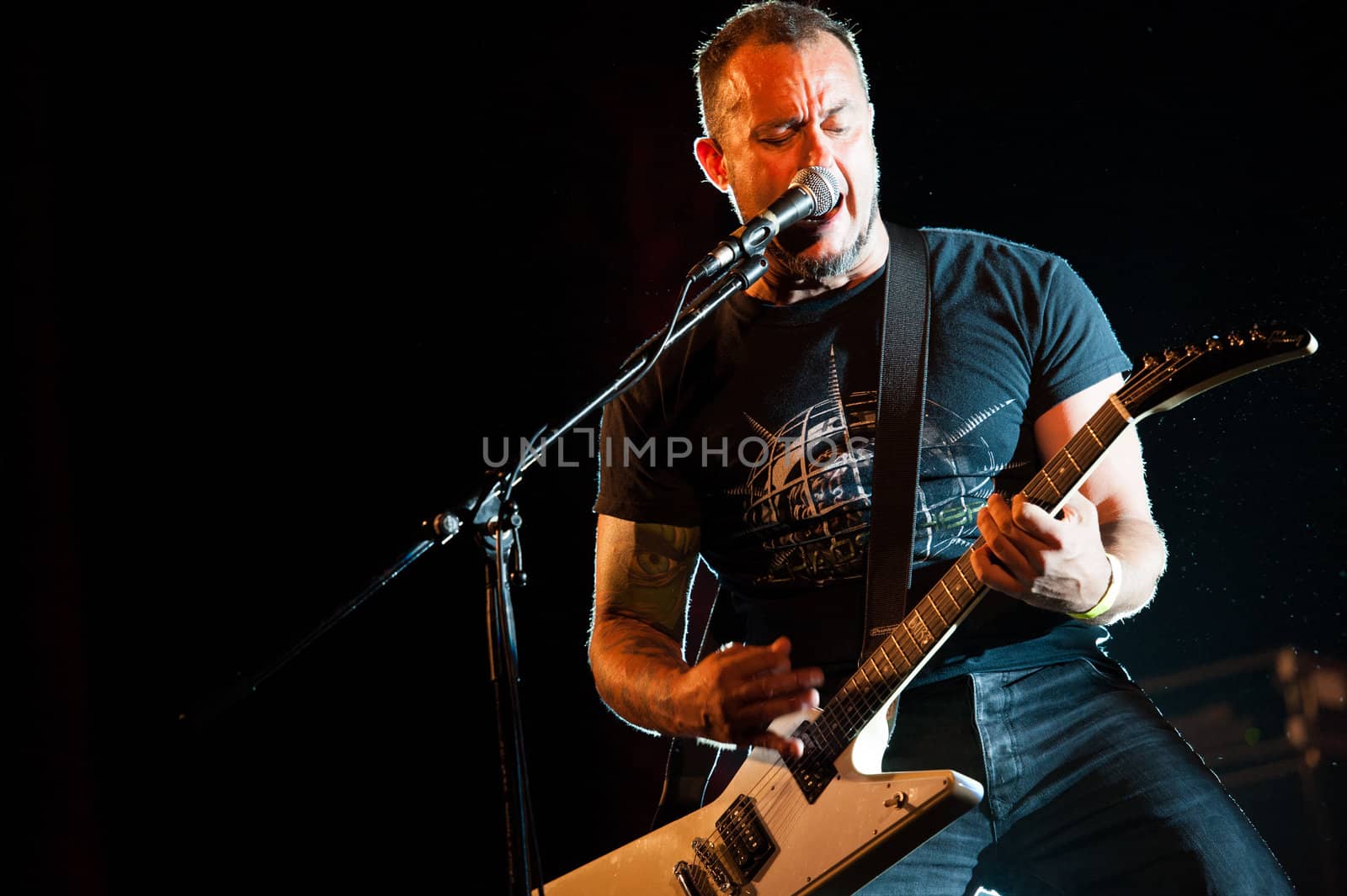 CANARY ISLANDS, SPAIN-JUNE 30: Singer and guitarist Brigido Duque from the band Koma, from Navarra in Spain, perform during Cebollinazo Rock in Galdar on June 30, 2012 in Canary Islands, Spain