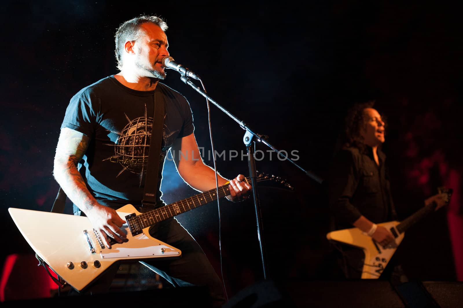 CANARY ISLANDS, SPAIN-JUNE 30: Brigido Duque(l) and Rafael Redin(r) from the band Koma, from Navarra in Spain, perform during Cebollinazo Rock in Galdar on June 30, 2012 in Canary Islands, Spain
