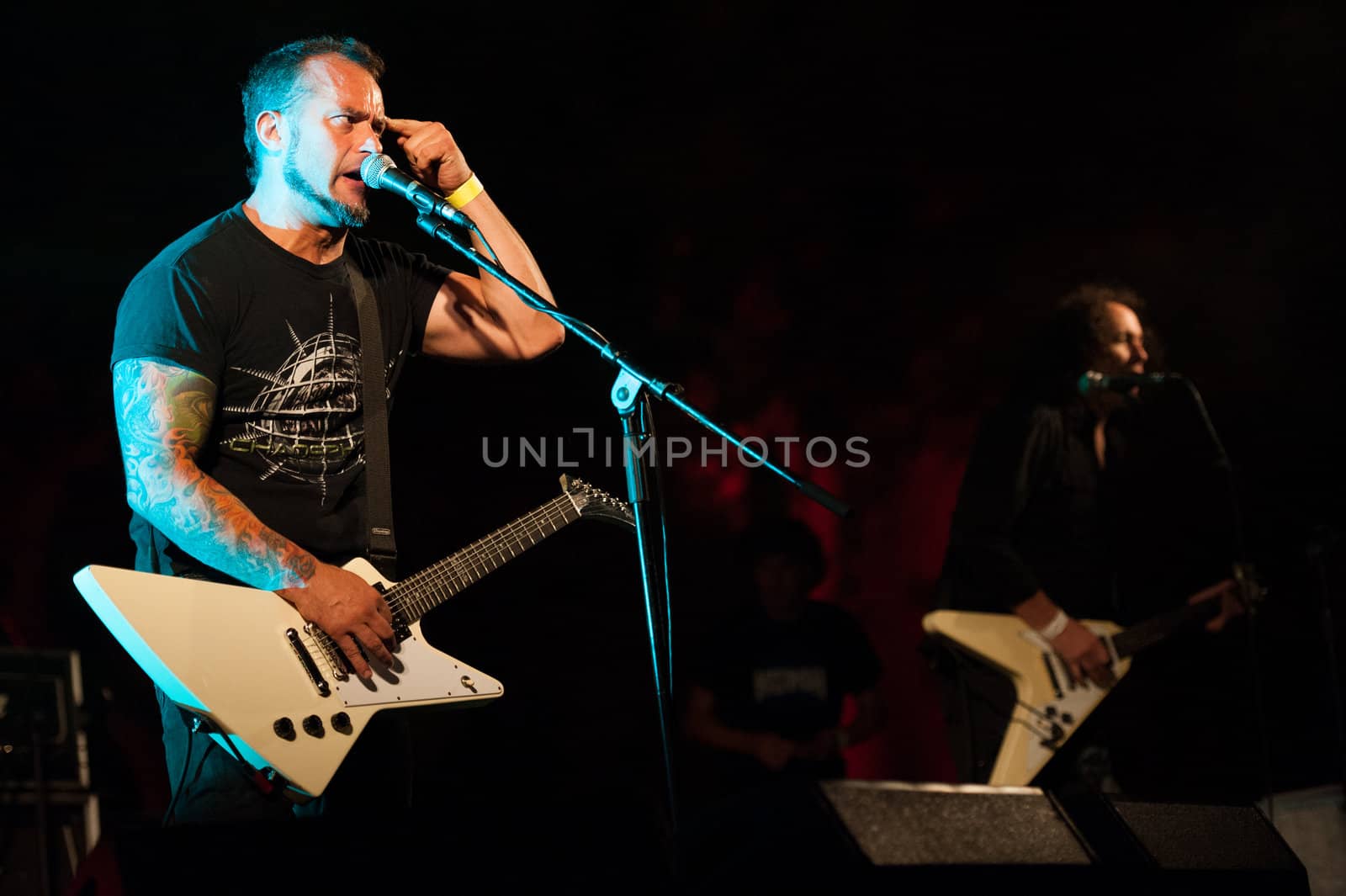 CANARY ISLANDS, SPAIN-JUNE 30: Brigido Duque(l) and Rafael Redin(r) from the band Koma, from Navarra in Spain, perform during Cebollinazo Rock in Galdar on June 30, 2012 in Canary Islands, Spain
