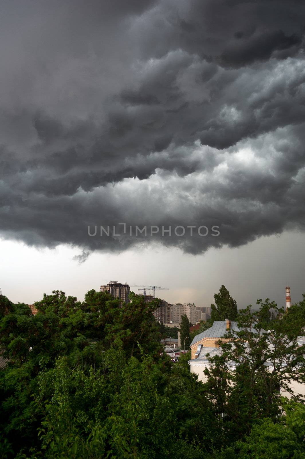 Dramatic cumulonimbus stormy clouds over city of Kiev, Ukraine