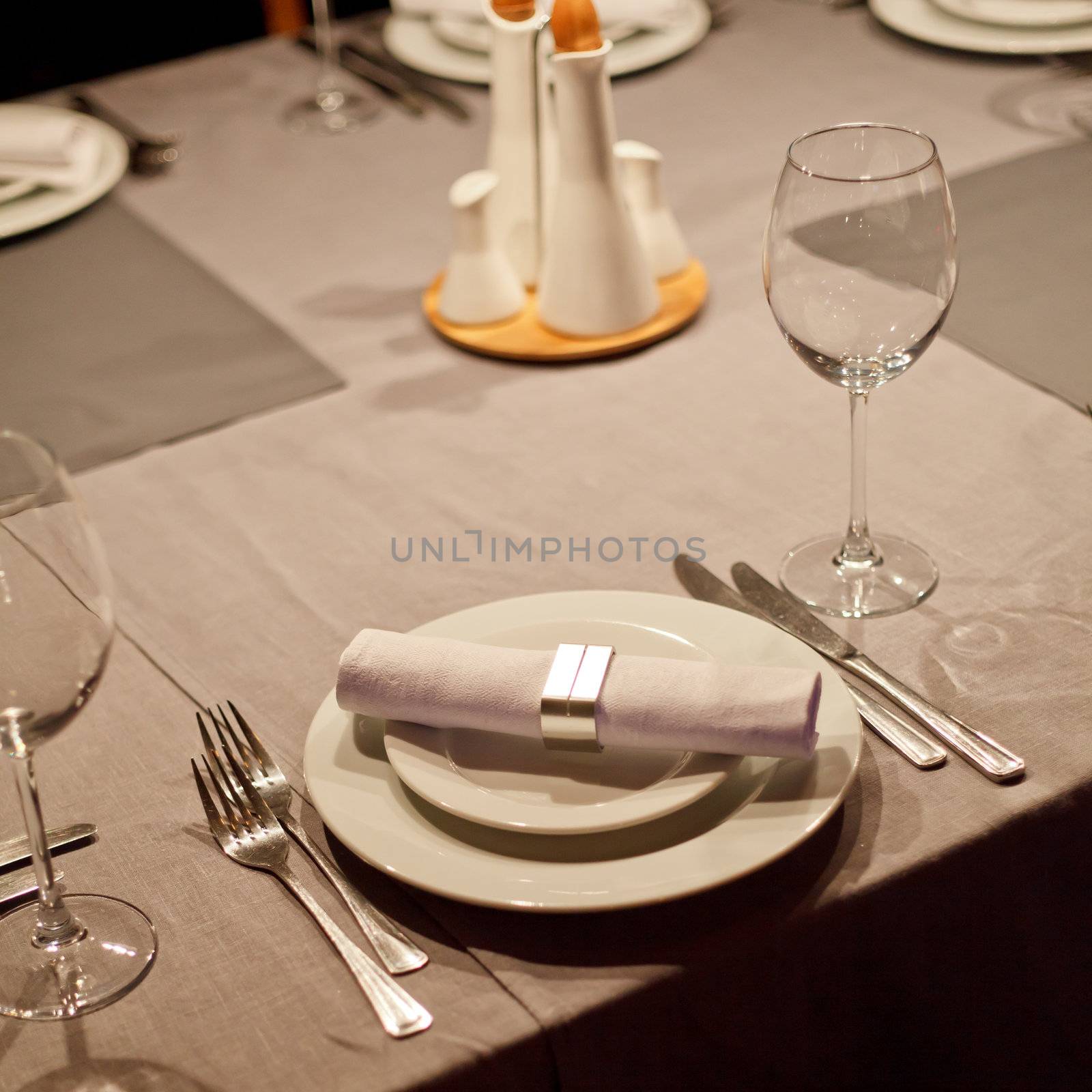 Tables set for meal by shebeko