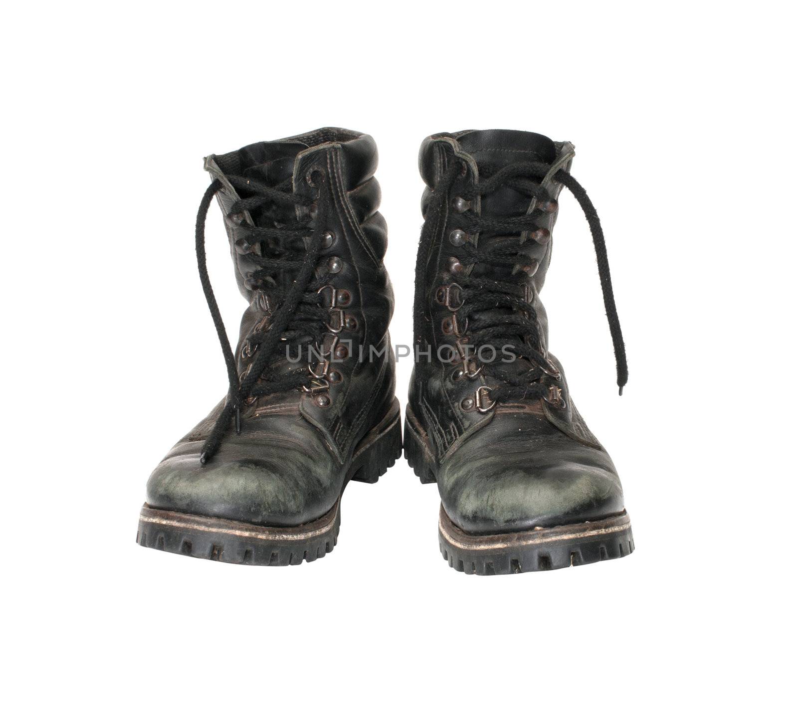 Pair worn army boots it is isolated on a white background.