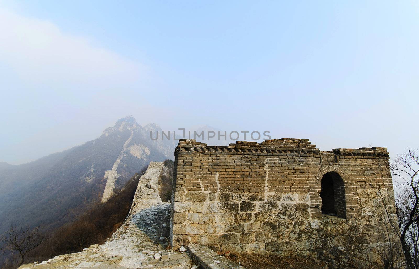 ruins of great wall of china on a foggy day