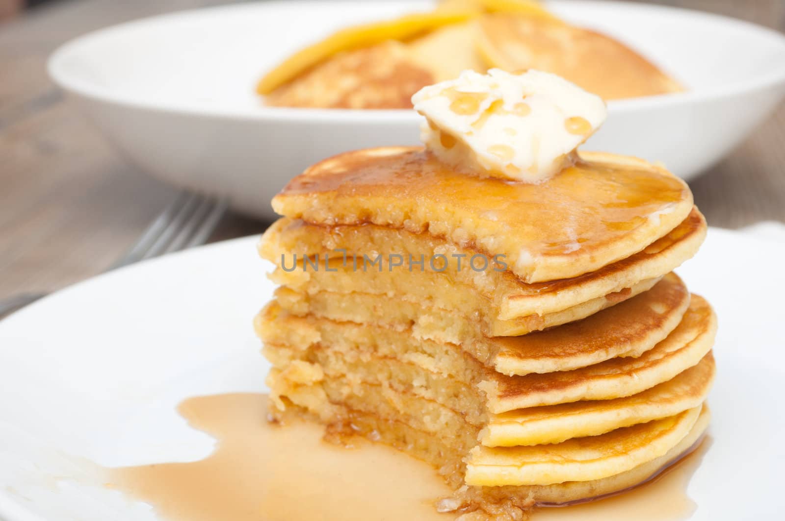 Homemade Pancakes With Butter and Warm Maple Syrup