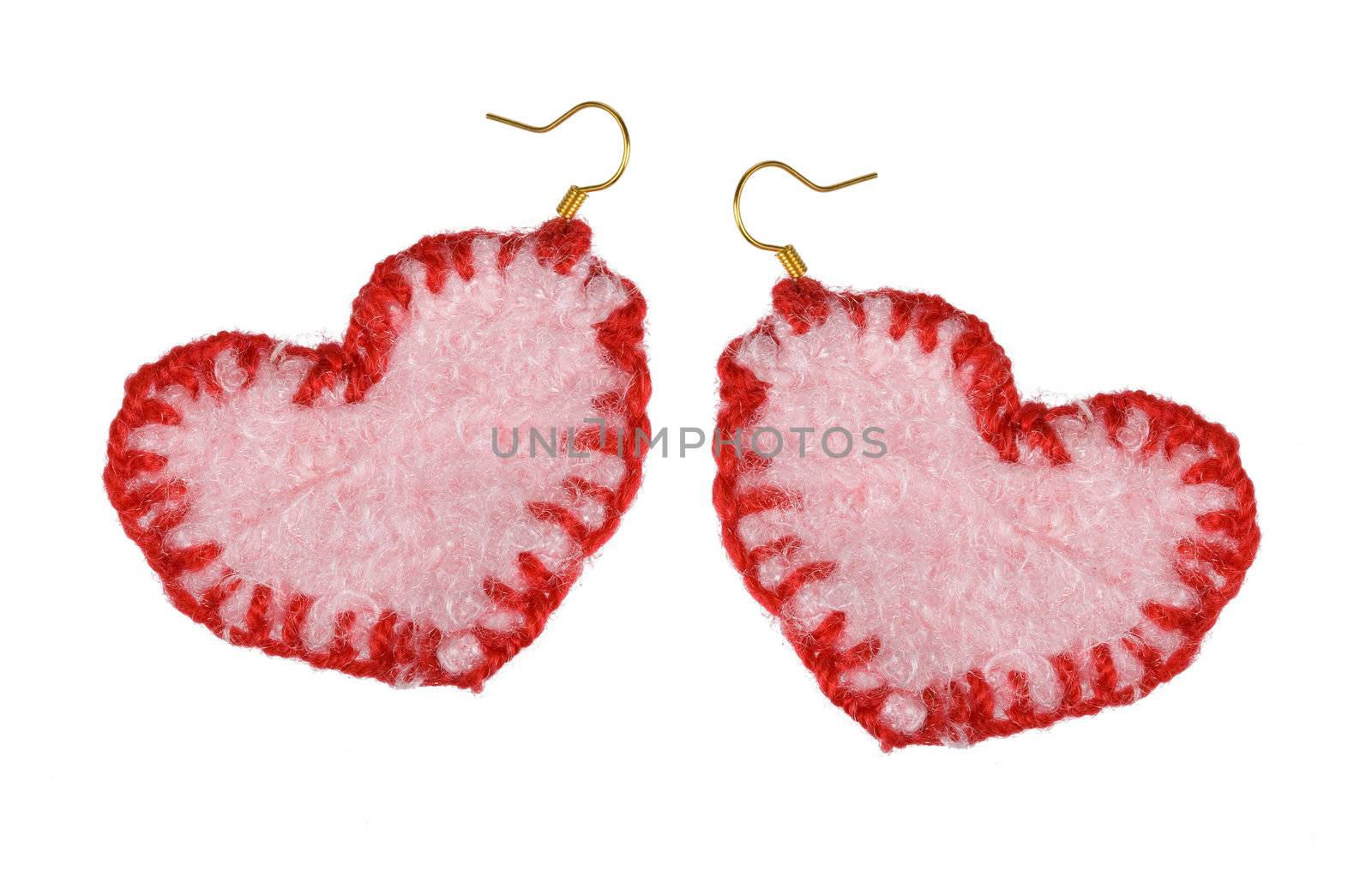 earrings in the form of the heart. Isolated on white. Collage. 