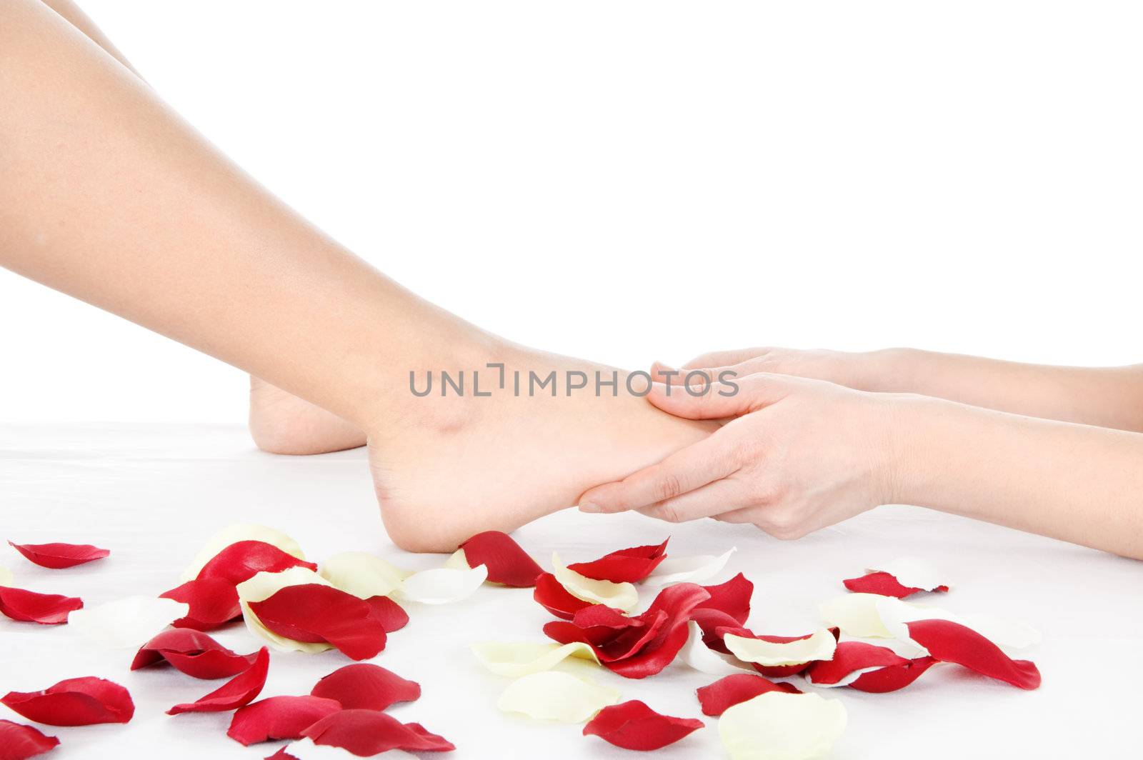 foot massage isolated on white background