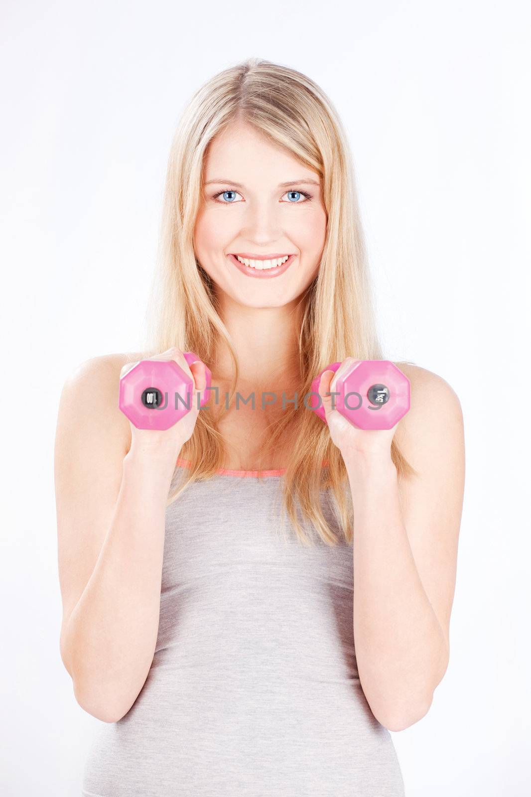 Young blond hair woman doing fitness exercises