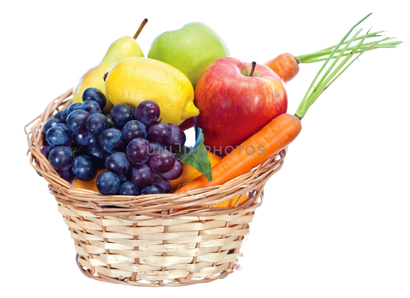Basket with fruits and vegetables, isolated on white