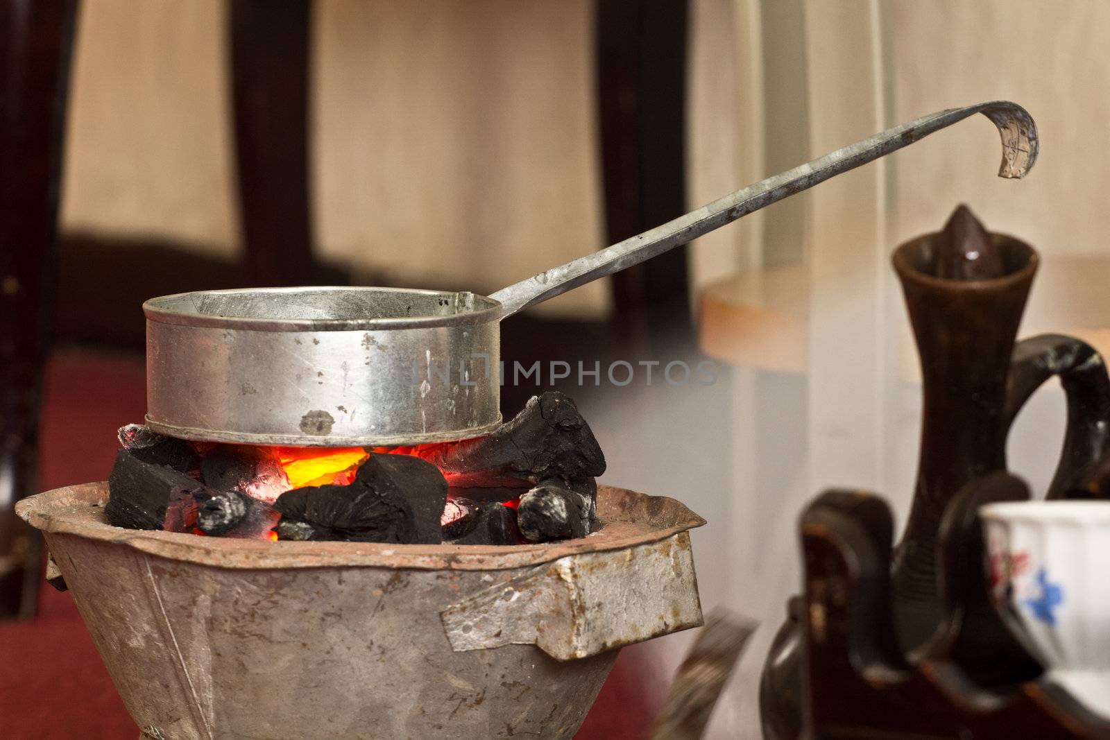 Roasting coffee beans to make coffee the traditional way