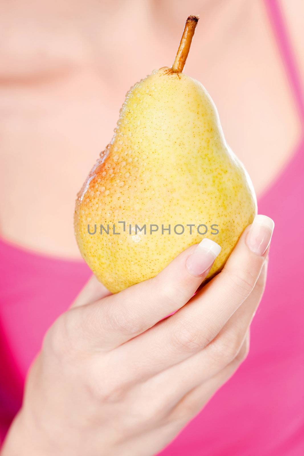 pear in woman's hand