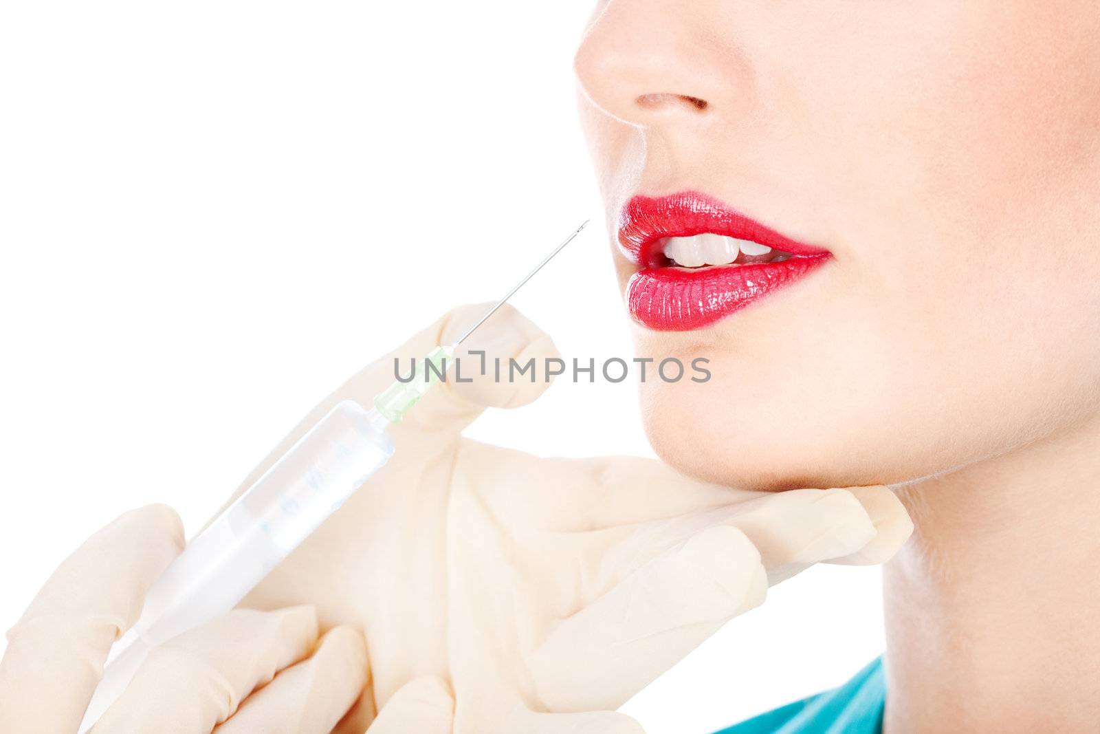 Syringe in hands to put silicone in lips, isolated on white