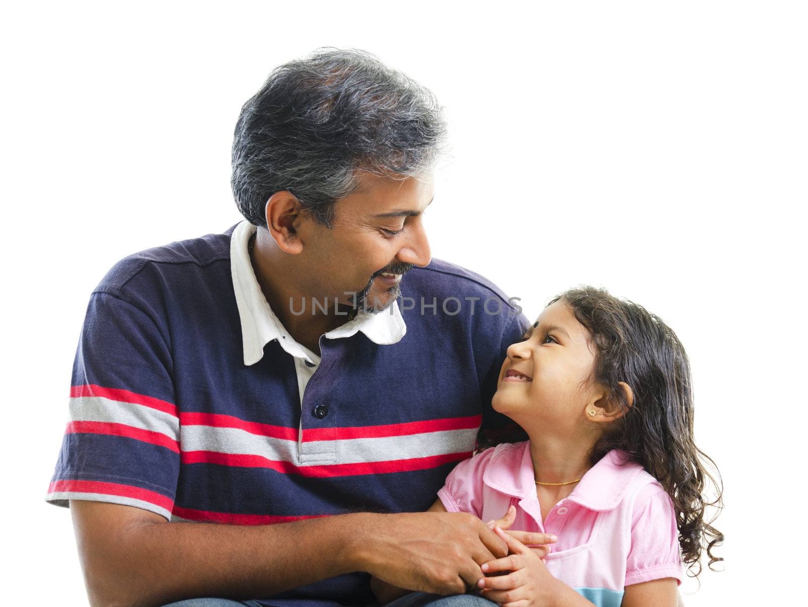 Asian Indian father having conversation with her daughter over white background