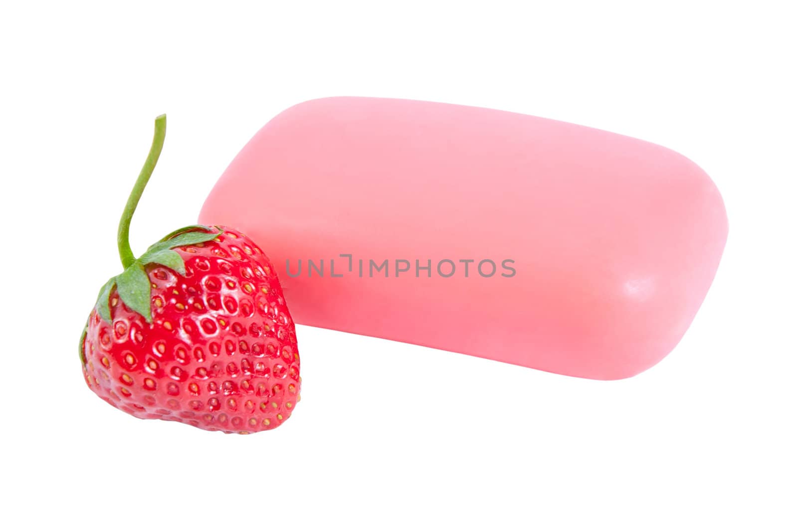 Natural soap with a strawberry isolated on white background