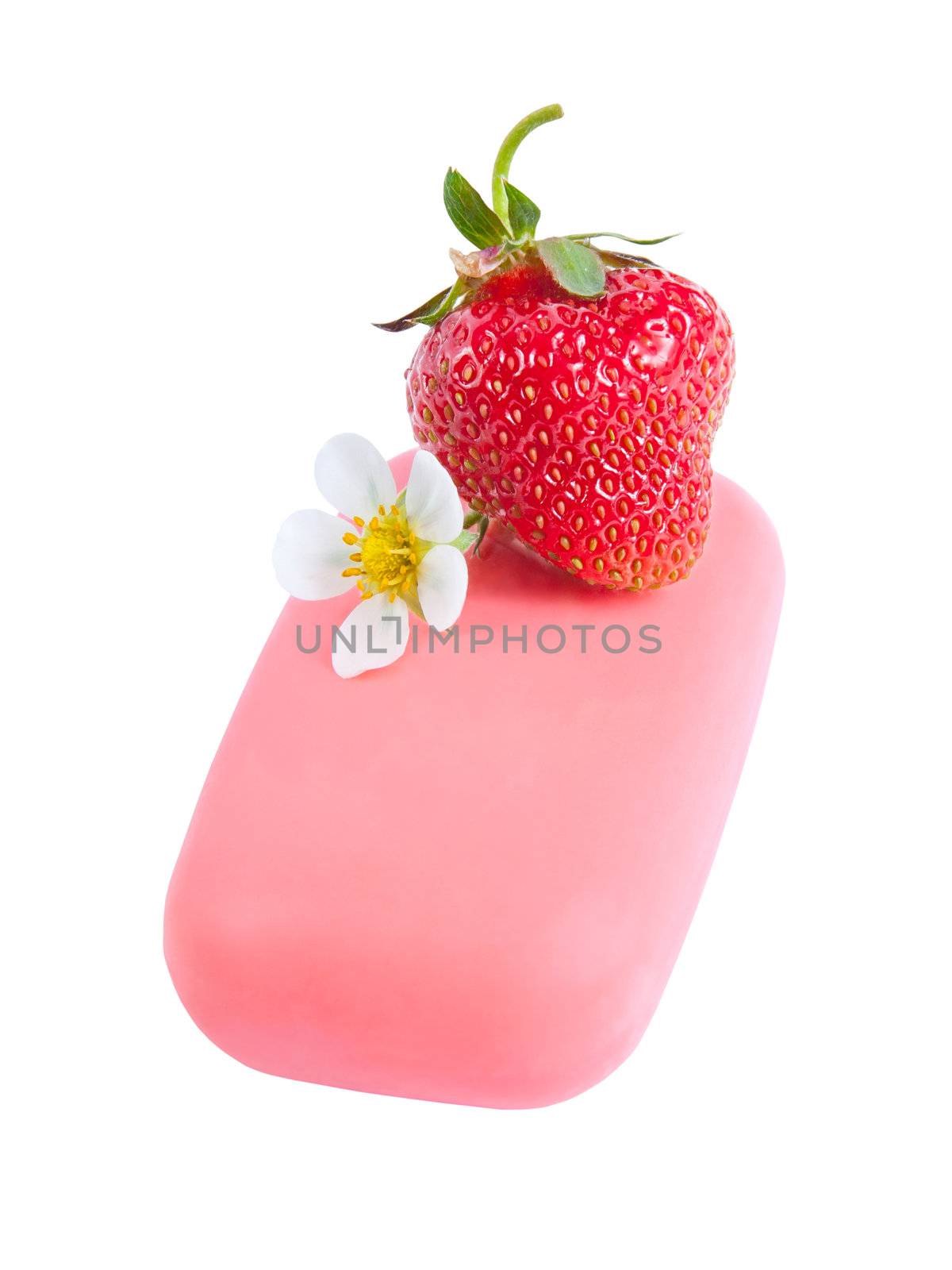 Natural soap with a strawberry and flower isolated on white background