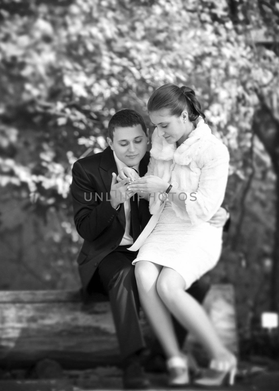 Black and white photography of a young married couple