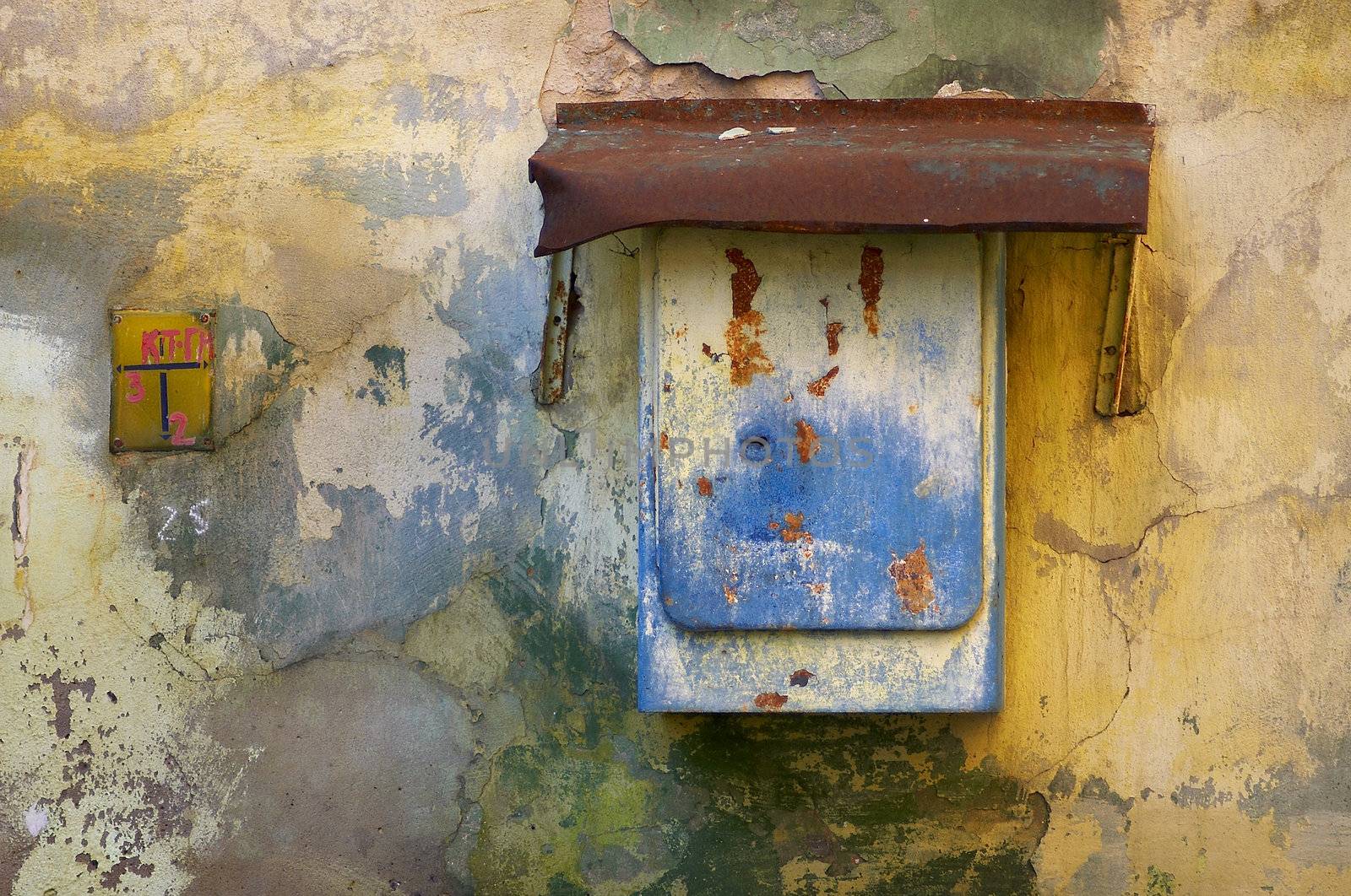 Colorful old wall with paint peeling off